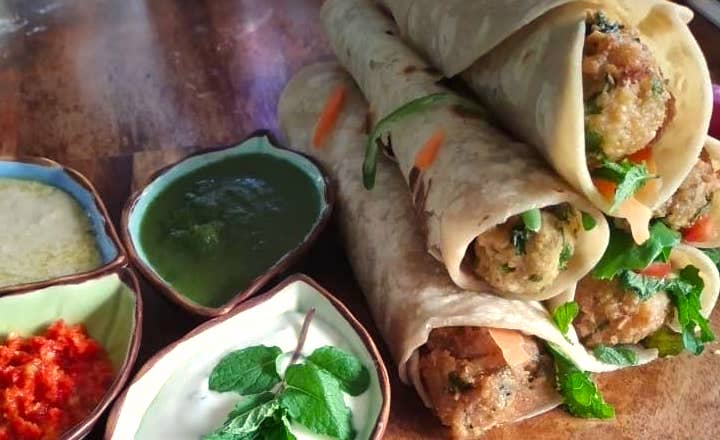 Roti wraps with falafel, yoghurt, mint, fresh chili and salad